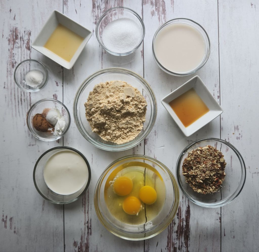 Ingredients needed to make easy gluten-free fluffy baked pecan pancake recipe.