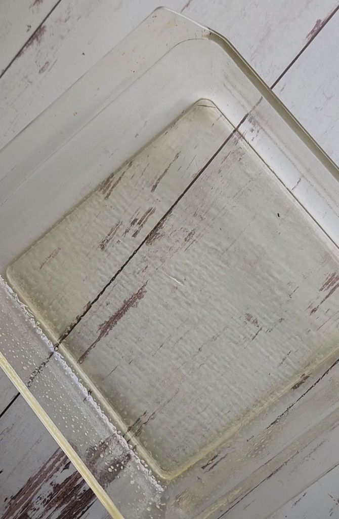 A greased 8x8 baking dish.