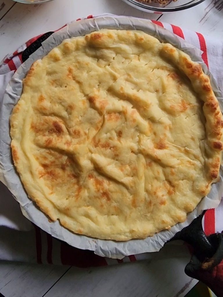 Gluten free 10-in round pizza crust par baked.