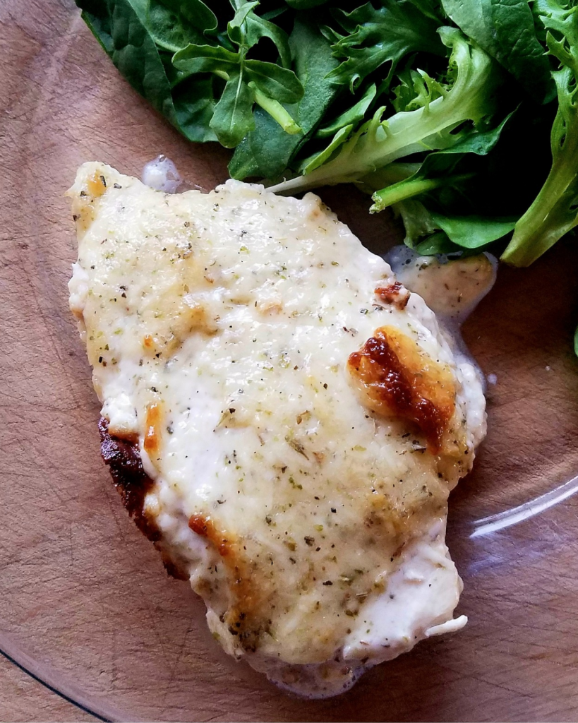 Gluten-free creamy Italian parmesan chicken dinner.