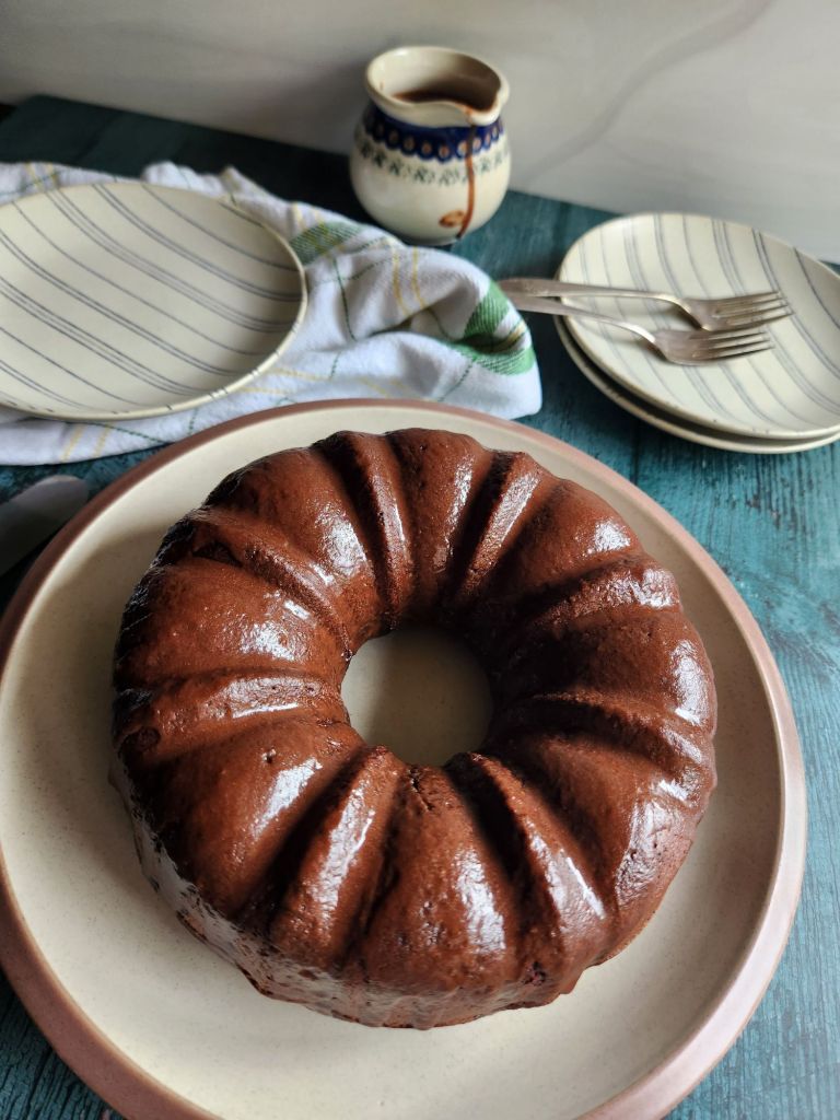 Gluten-free Bailey's Irish cream chocolate bundt cake with chocolate glaze on.