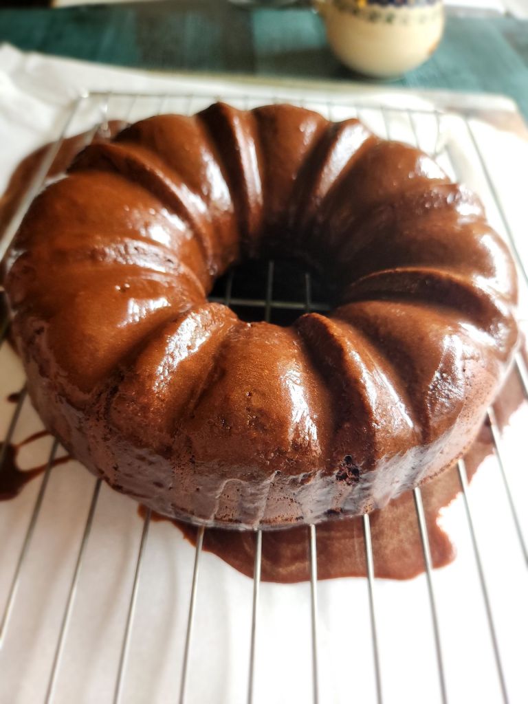 Gluten-free Bailey's Irish cream chocolate bundt cake with chocolate glaze on.