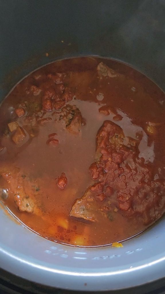 Easy gluten-free copycat McCormick Swiss steak recipe finished in instant pot.