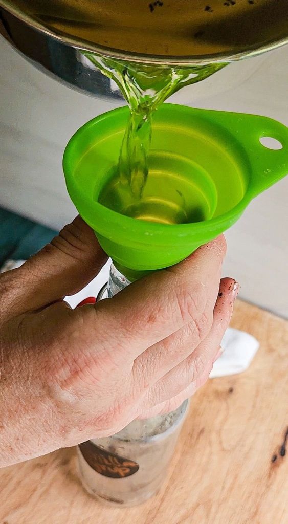 Bottling up prepared easy low carb Starbucks Copycat vanilla syrup recipe.