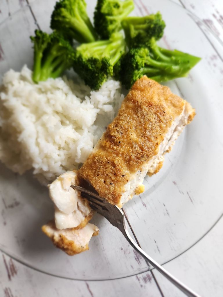 Gluten-free baked almond, crusted.Lemon garlic halibut baked.