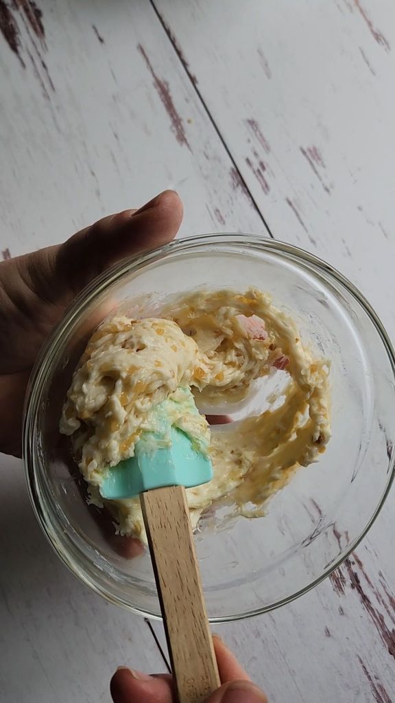 Lemon garlic butter compound to make gluten-free baked almond crusted with lemon garlic halibut.