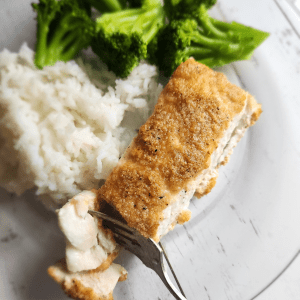 Gluten-free baked almond, crusted.Lemon garlic halibut baked.