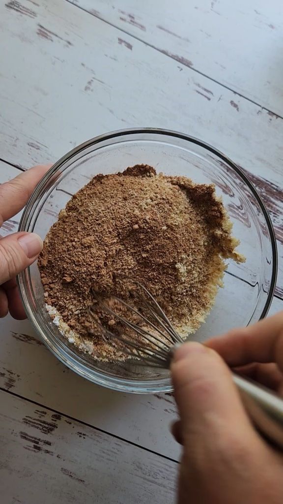 Mixing dry ingredients for The best dairy free low carb chocolate cake recipe.