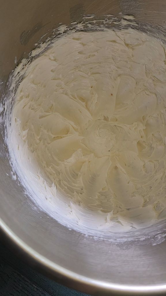 Whipped butter and coconut oil for easy dairy-free low carb buttercream frosting recipe.