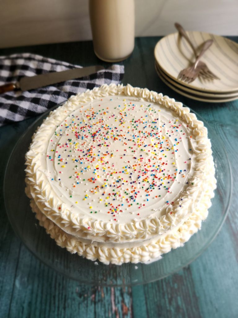 easy dairy-free low carb buttercream frosting on a chocolate cake.
