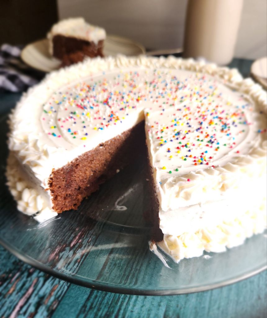 easy dairy-free low carb buttercream frosting on a chocolate cake.