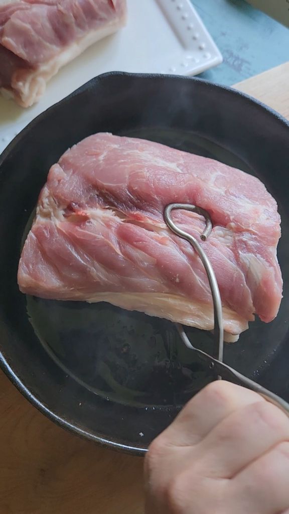 Searing pork loin roast for The Best Slow Cooker Italian Pork Loin Roast Recipe.