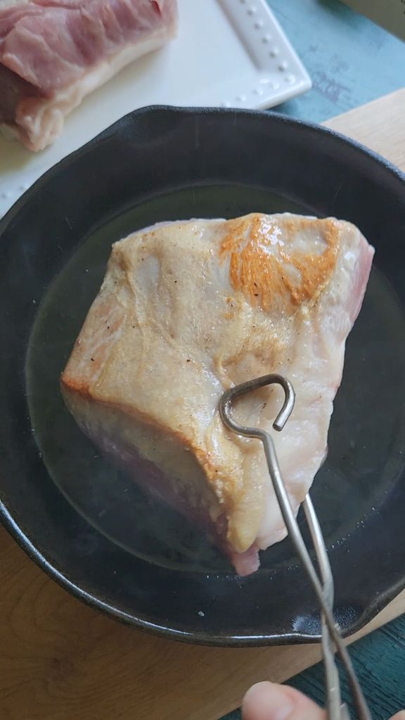 Searing pork loin roast for The Best Slow Cooker Italian Pork Loin Roast Recipe.