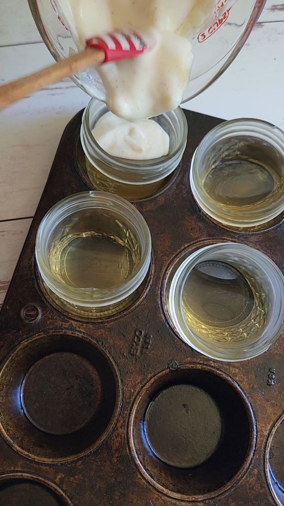 Pouring cream and jel blended layer for easy keto jello creamsicle parfait dessert recipe.