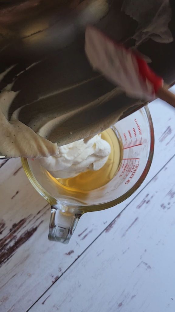 Adding whipped cream to the jel mixture for easy keto jello creamsicle parfait dessert recipe.