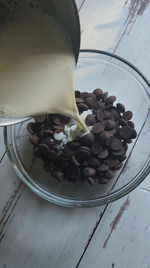 Whisking ganache topping.