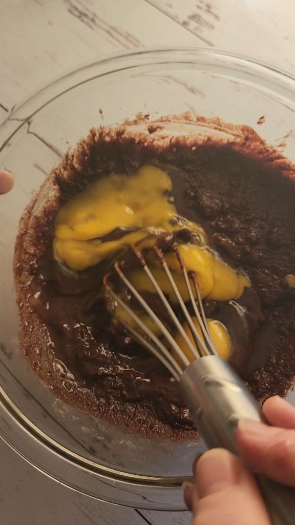 mixing Easy gluten free little debbie fudgy brownie recipe.