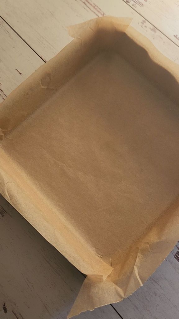 8x8 pan lined with parchment paper.