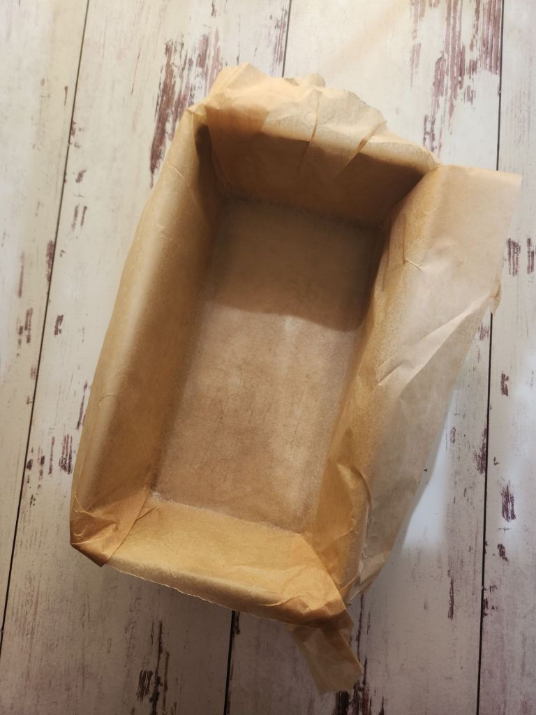 Parchment lined bread pan.