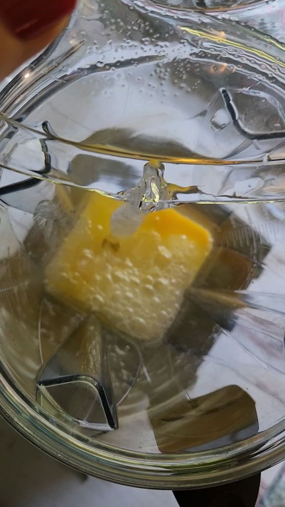 Wet ingredients added to blender for Easy gluten free protein waffles.