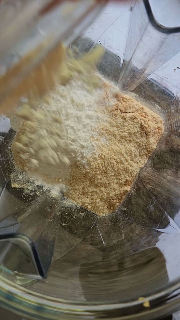 Dry ingredients added to blender for Easy gluten free protein waffles.