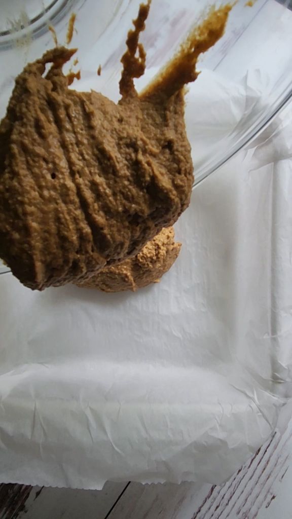 Pouring batter for Gluten free low carb pumpkin pecan crunch coffee cake.