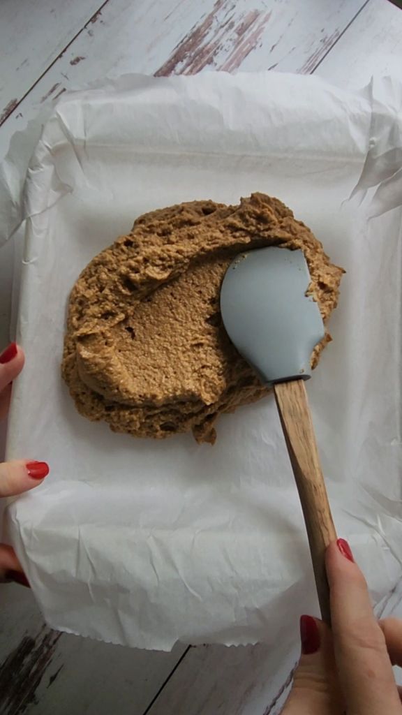 Spreading batter for Gluten free low carb pumpkin pecan crunch coffee cake.