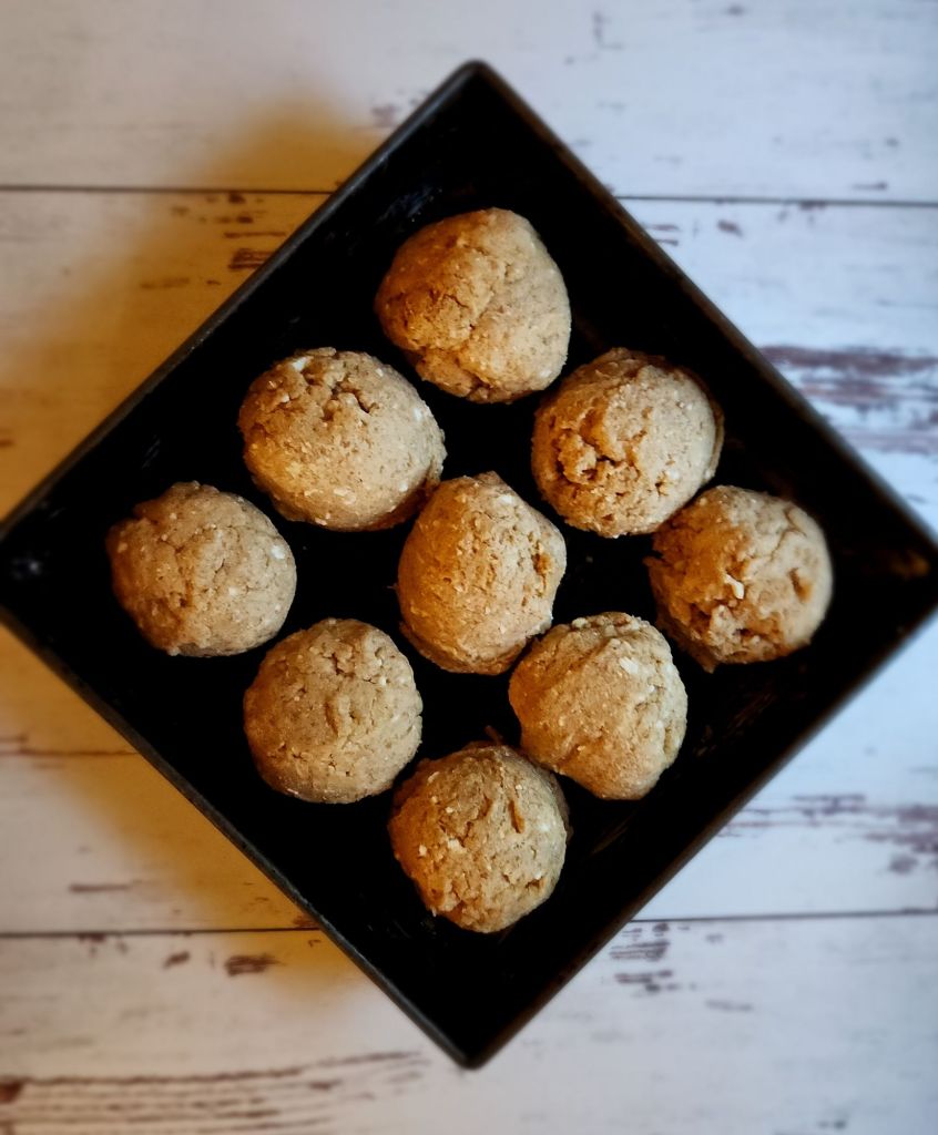 The best gluten free low carb bread recipe made into large rolls in a metal pan.