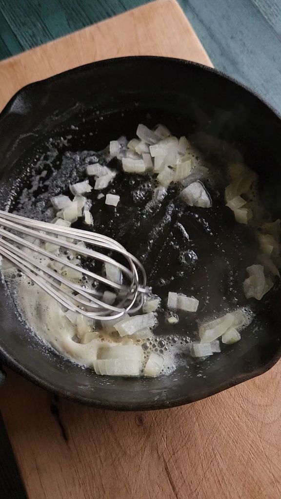 Sauteeing onions in butter.