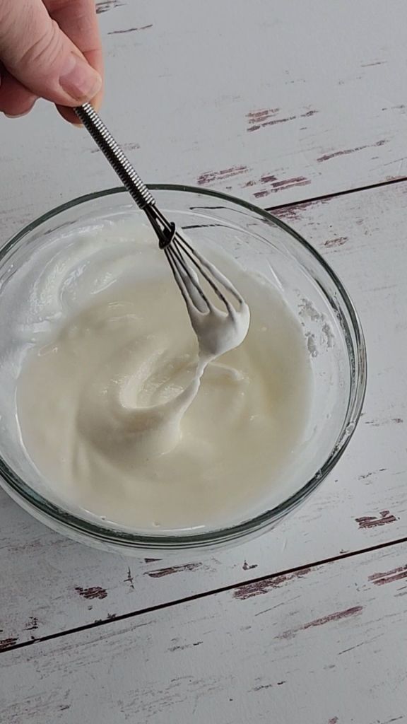 Whisking lemon glaze for easy gluten , free irish spice cake