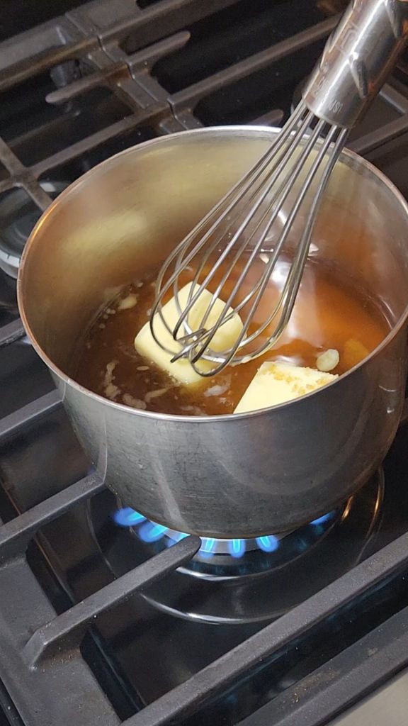 Melting butter and sugar in a saucepan