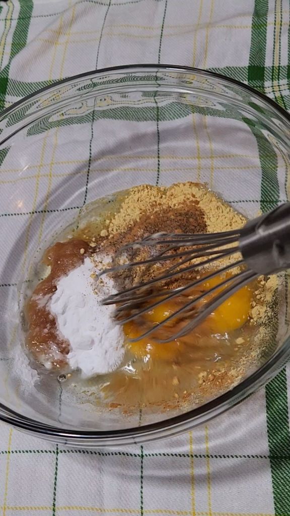 Whisking spices into eggs for easy gluten , free irish spice cake